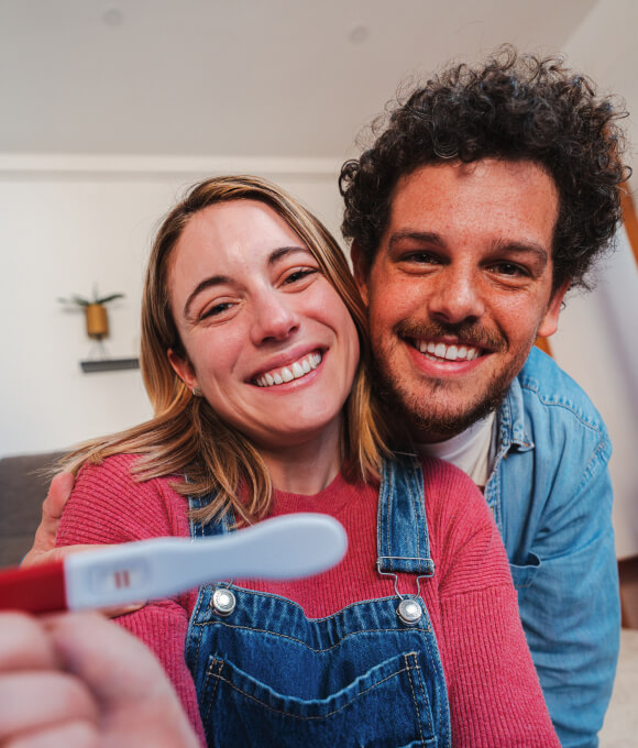 Happy couple becoming parents through egg donation
